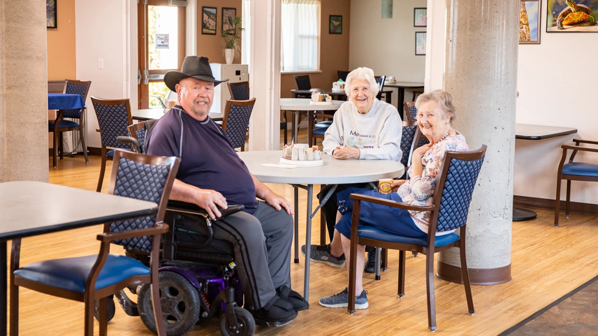 group of people smiling at a camera